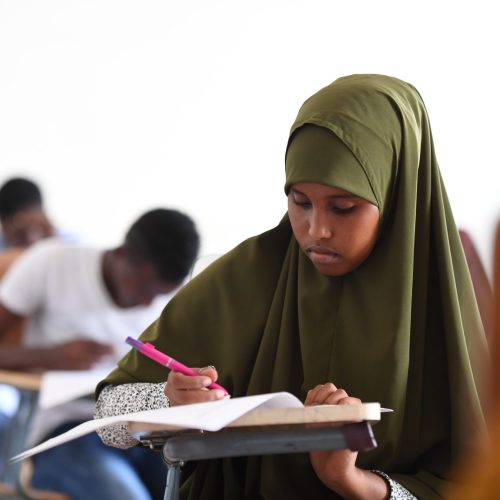 Secondary students take their national examinations in Mogadishu, Somalia, on 22 May 2018. Original public domain image from Flickr